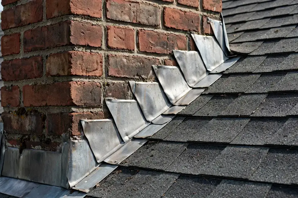 Chimney flashing where a brick chimney meets the roof in Union City NJ