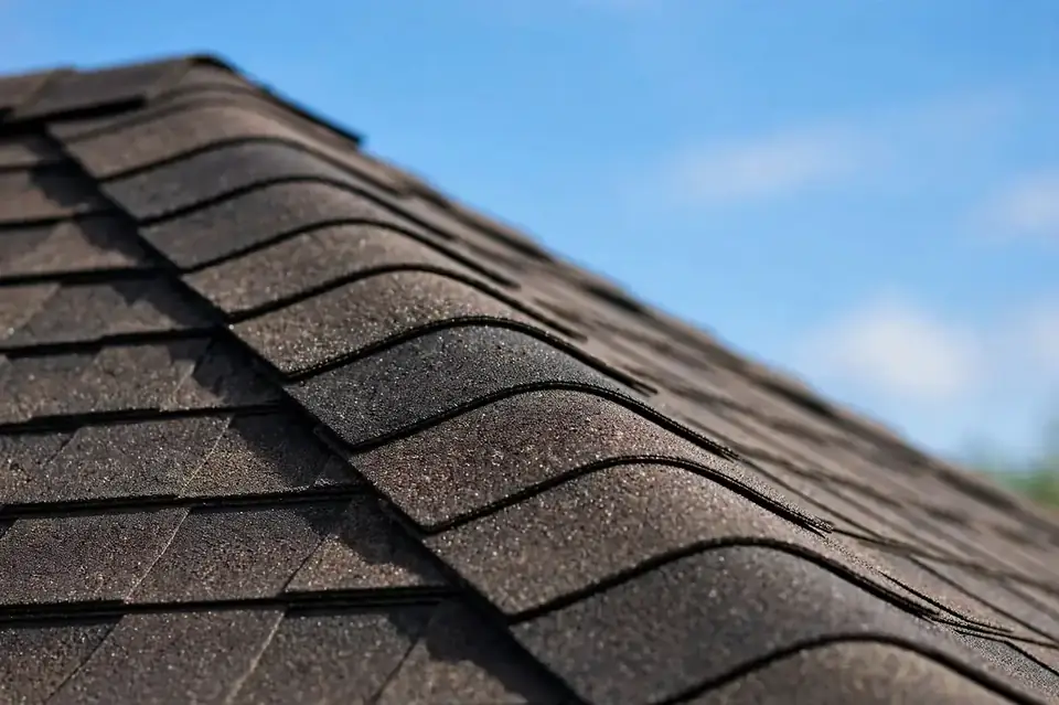 Ridge cap shingles along a roof peak in Union City NJ