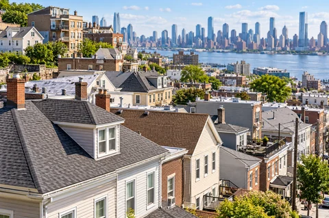 Illustrative rooftop scene, not a verified photograph of the named city